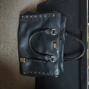 Chic Black Leather Handbag with Gold Accents